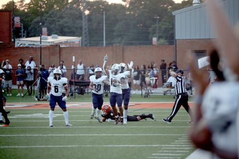 Elbert County Blue Devils (L-R) Trevion Swinger, Miguel Rodriguez, D.J. Fortson and Reunte Tucker celebrate after Fortson recovered a Hart County fumble. Elbert went on to win the game 24-14 and are ranked No. 4 in Class A Division 1 by the Atlanta Journal-Constitution. (Photo by Wells)