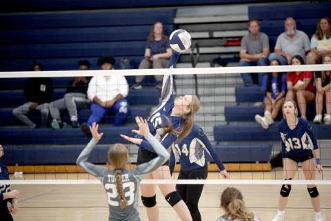 Johna Johnson leaps to spike the ball in the Volley Devils’ 2-0 loss to Madison County Aug. 29. (Photo by Wells)