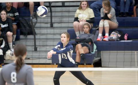 Ryleigh Stowers bumps the ball during Elbert County’s 2-0 loss to Prince Avenue Sept. 7. The Lady Devils went on to defeat Commerce 2-1 later in the evening. (Photo by Wells)
