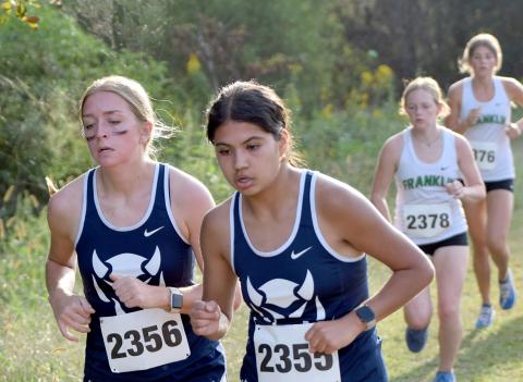 Lady Devil runners Isabella Harpold (left) and Linda Garcia (right) led the Lady Devils in Franklin County Oct. 5. (Photo by Shane Scoggins, Franklin County Citizen Leader)