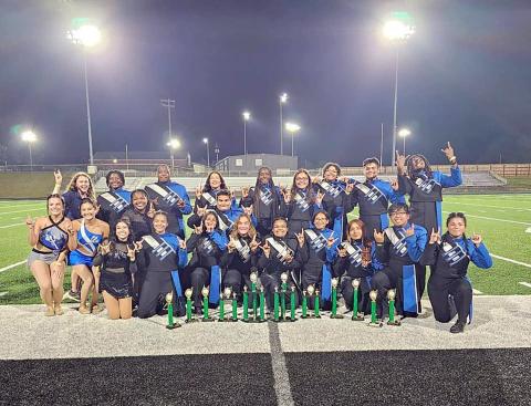 The Elbert County Blue Devil Band leadership team poses with a collection of trophies won at the Pridelands Marching Competition in Franklin County Sept. 30. (Photo submitted by Ansley McNeese)