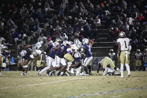A host of Devils tackle a Swainsboro player during Elbert’s 34-28 loss to the Tigers Nov. 24. The loss brings Elbert’s season to a close after the Devils reached the 10-win mark for the second consecutive season. (Photo by Wells)