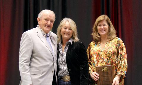 From left, Georgia Farm Bureau (GFB) President Tom McCall presents Elbert County Farm Bureau (ECFB) President Mandy Williams and ECFB Office Manager Haley Oakley with a GFB Rewarding Excellence in Ag Program Planter Award in the organization’s large membership division. The award was presented on Dec. 4 during the 86th Annual Georgia Farm Bureau Convention held on Jekyll Island.