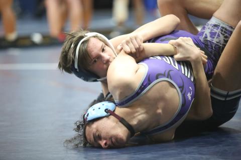 Hudson Fleming traps his opponent’s arm on his way to a pin during Elbert’s 77-6 dual win over Duluth Dec. 9. (Photo by Wells)