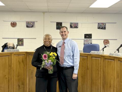 BOE Chair Teresa Barnett and Superintendent Robert Wheeler pose for a picture after Barnett was recognized for her 17 years of service to the BOE. (Photo by Wells)