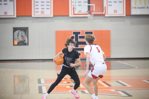 Grady Jones tries a crossover move on a Social Circle defender. (Photo by Wells)