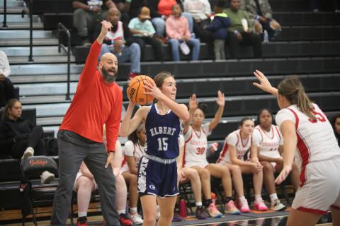 Reagan Baker looks for a pass while the Wade Hampton coach adjusts his players. (Photo by Wells)