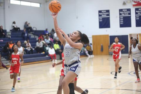 London Billings lays the ball into the basket to cap off a fast break opportunity for the Lady Rams. (Photo by Wells)