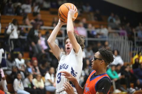 Grady Jones goes up with the ball as he tries to lay the ball into the basket during Elbert’s loss to Cedar Shoals. (Photo by Wells)