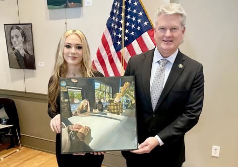 Elbert County Comprehensive High School senior Braelyn Bozarth (left) won the 2024 Congressional Art Competition hosted by Rep. Mike Collins (right). 