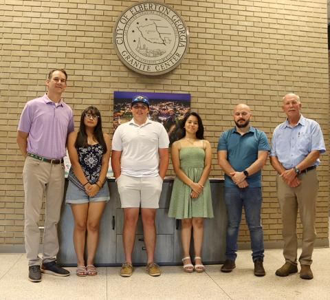 Meeting at City Hall for the 2024 Sister City Exchange proclamation issued June 14 are (L-R) Mayor Daniel Graves, Naomi Bernal, Walker Lane, Daniella Alcade, Dustin Ayers and Chairman of the Elberton Sister City program Tom Evans. (Photo by Weeks)