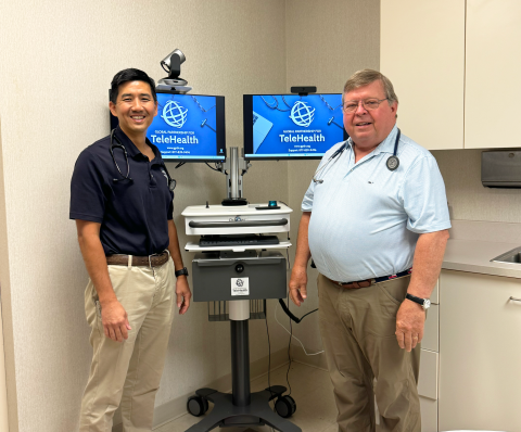 (Above L-R) Dr. Jonathan Poon and Dr. Dan McAvoy stand with the new telehealth cart provided to the Medical Center of Elberton as part of the KidsABC program.  (Photo by Weeks)