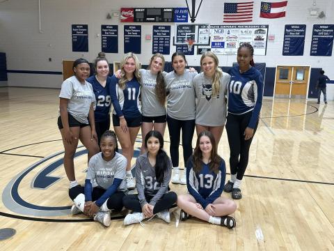 The Lady Devils volleyball team poses for a picture after picking up a 2-0 win over Washington-Wilkes. Aug. 20. 