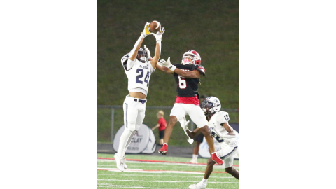 No. 24 Jose Rodriguez times his jump perfectly and intercepts a Stephens County (Photo by Wells)