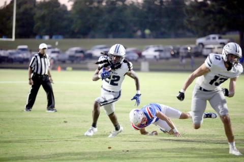 Elbert running back Jacari Barnett leaves an Oglethorpe defender in his wake as he rushes into the end zone for his first of three touchdowns. (Photo by Wells)
