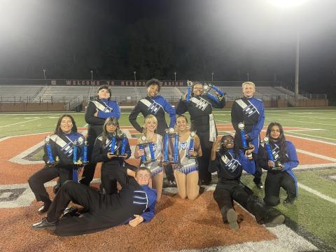 The Elbert County Blue Devil Band earned four first-place finishes and a superior rating in every category during the Lake Hartwell Marching Band Competition Oct. 19. Pictured with their collection of trophies are (front) Landon Bowman, (second row, L-R) Jocelyn Castillo, Naomi Bernal, Sydney Prince, Emily Poon, Micah Stribling, Devisha Desai and (back row, L-R) Emma Haynie, Nadia Hughes, Zuri Reid and Liam Wilder. (Photo courtesy of Elbert County Blue Devil Band)