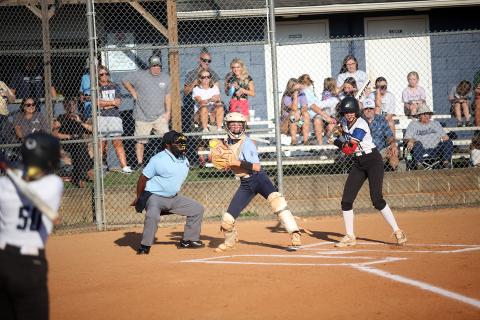 Reagan Baker pops up and looks to first after fielding a pitch during the game against Barrow Arts and Sciences Academy. (Photo by Mark Wells)