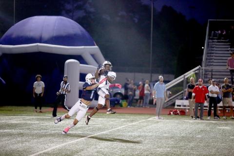 Ty’Rikis Jones makes a leaping grab in front of a Providence Christian defender during Elbert’s 48-6 victory over the Storm. (Photo by Mark Wells)