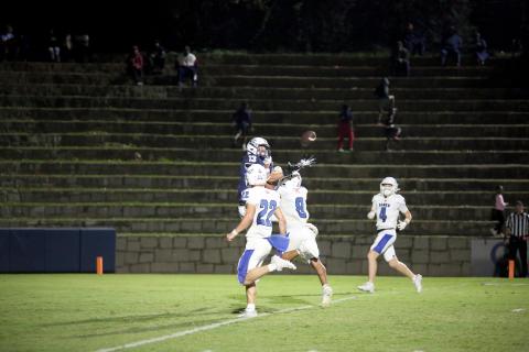 Brady Dickerson makes a contested catch in double coverage during Elbert’s homecoming win over Banks County Oct. 11. (Photo by Wells)