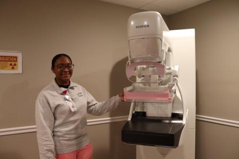 Mammography technician Alayjah Sammons shows the new Fuji Cristalle mammography machine at Elbert Memorial Hospital. (Photo by Weeks)