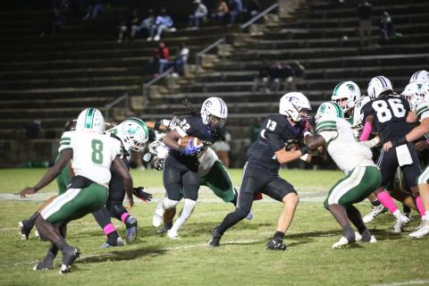 No. 22 Jacari Barnett follows lead blocker No. 13 Brady Dickerson during Elbert’s loss to Athens Academy Oct. 18. Barnett finished with 179-yards rushing and three touchdowns on 31 carries. (Photo by Wells)
