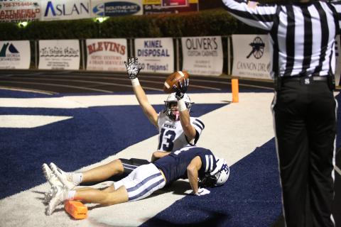 No. 13 Brady Dickerson looks for the referee’s signal after scoring the game-sealing touchdown with just over three minutes left in Elbert’s 28-13 win over Gordon Lee Nov. 15. (Photo by Wells)