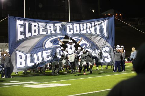 Senior Jayven Hickman leads the team onto the field at the beginning of the playoff game against Heard County High School in Franklin Friday, Nov. 22. The Blue Devils bested the Braves 26-24, qualifying them as one of the "Elite Eight" in the Class A Division 1 State Tournament. The Devils will face the Toombs County Bulldogs Friday in Lyons. Check the ECCHS Athletics website to comfirm the start time. (File photo by Wells)