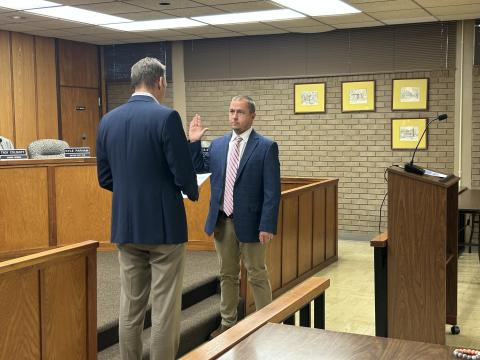 Elberton Mayor Daniel Graves (left) swears in city council member Kyle Parham  (right) as the 2025 Mayor Pro Tempore during the Jan. 6 regular meeting. (Photo by Wells)