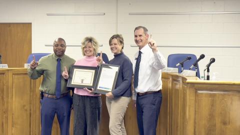 Elbert County Elementary School principal Jasper Huff, Elbert County Primary School principal Christy Hart, Paul J. Blackwell Learning Center Principal Laura Albertson and Elbert County School Superintendant Robert Wheeler celebrate being the top of the list for their recent designation as a Title I Rewards School for student achievement during Monday’s board of education meeting. (Photo by Weeks)