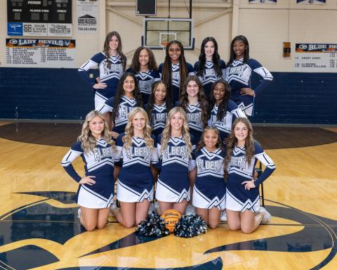 The 2024-2025 varsity basketball cheerleaders include Riyahanna Ardister, Kendall Baston, Brylie Burdette, Jennifer Flores, Kelsie Hayes, Leah Higginbotham, Jaslyn Huff, Lila Layne, Cadence Noggle, Jurnee Porter, Brailey Sims, Bailee Starrett, Ja’Nydra Watts and Ijianah Whiten. The squad is coached by Head Coach Lexi Biggs and Assistant Coach Dayna Fortson. (Photo by Mercer Harris)