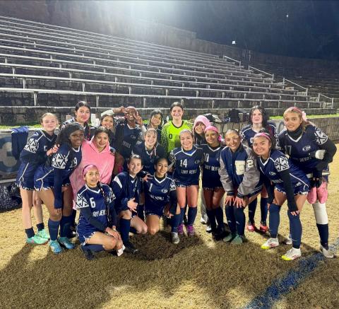 The Lady Devils soccer team poses for a team picture after dominating Jefferson County by a score of 9-0 in the Inferno Feb. 11. (Photo by Wells)