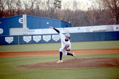 Jackson Black lets a pitch fly during Elbert’s 13-6 win over Washington-Wilkes Feb. 24. (Photo by Wells)