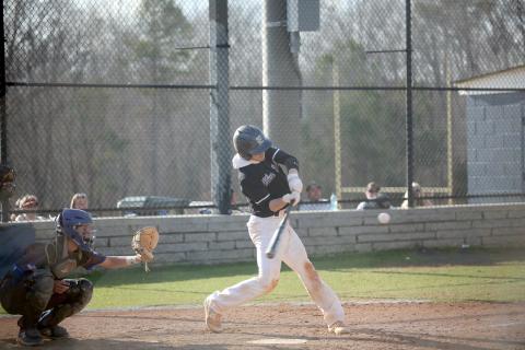 Brycin Hughes gets his swing around and makes contact with the ball during the first game of Elbert’s home doubleheader against Barrow Arts and Sciences Academy March 14. (Photo by Wells)