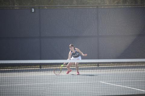 Gracie Kidd reaches for a forehand shot during Elbert’s home match against Rabun County March 19. (Photo by Wells)