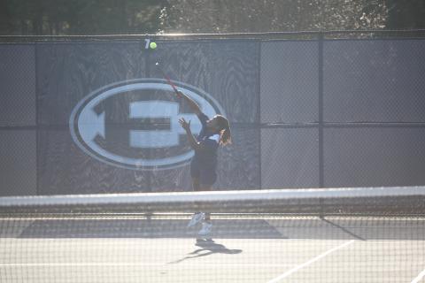 Jasean Jenkins serves the ball during a match against Washington-Wilkes. (Photo by Wells)