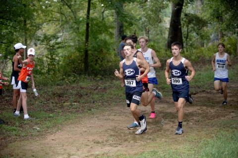 Dakota Toole (left) and Eli Alexander (right) led the Devils in their most recent cross country meet hosted by East Jackson. (File photo by Bo Underwood)