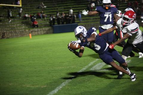 Senior wideout D.K. Winn reaches for the goal line and scores during Elbert County's 21-17 loss to Stephens County on August 21. (Photo by Bo Underwood)