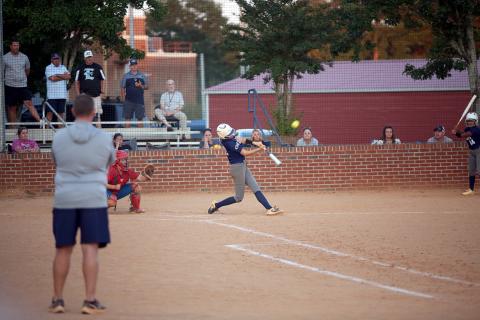 Bryleigh Dickerson hits her second of two home runs during Elbert County’s 15-0 win over Oglethorpe. (Photo by Bo Underwood)