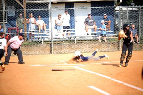 Elbert County catcher Ky Dubose slides into home plate in Elbert County’s 8-4 win over Commerce on Sept. 18. (Photo by Bo Underwood)
