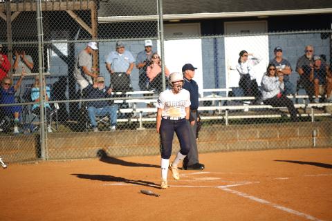 Audrey Lunsford celebrates a run. (File photo by Bo Underwood)