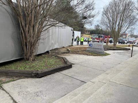 A truck overturns in front of the Inferno. (Photo by Mark Wells)