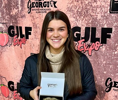 ECCHS senior Leah Higginbotham finished as the high point winner in the Senior Dairy Showmanship Point Circuit for the past year. (Photo courtesy of Kimberly Higginbotham)