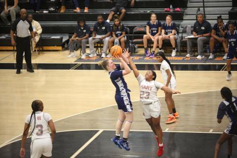 Audrey Lunsford pulls up and lets a mid-range jumper fly. (File photo by Mark Wells)