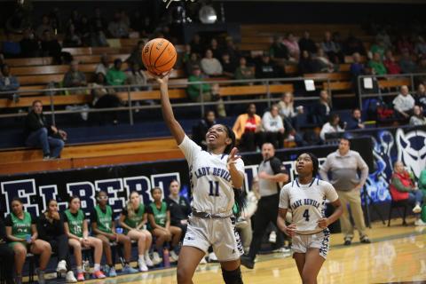 Tiyah Turman makes a layup against Franklin on Dec. 9. (Photo by Bo Underwood)