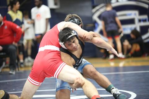 Jesus Mills shoots for a takedown. (File photo by Mark Wells)