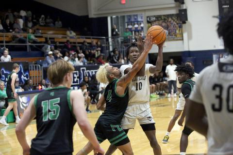 A.J. Brown (10) goes up for a basket in the lane against Franklin County . (File photo  by Bo Underwood)
