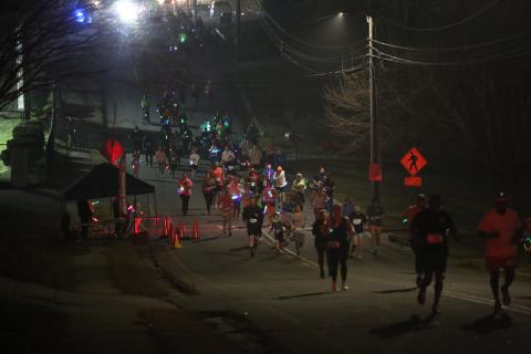 A total of 157 participants ran in the Twilight Stroll by the Granite Bowl Jan. 9. The event was a "glow run" and runners donned neon apparel and accessories. (Photo by Mark Wells)