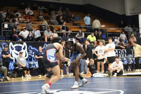 Javares Bowman (above) offers a grin as he faces his opponent (Photo by Mark Wells)