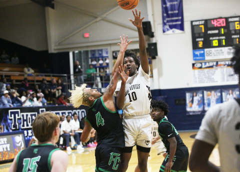 A.J. Brown puts up a contested inside shot. (File photo by Bo Underwood)