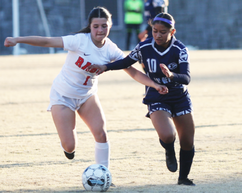 Kimberly Hernandez fights for the ball during a game against Rabun last season. (File photo by Mark Wells)